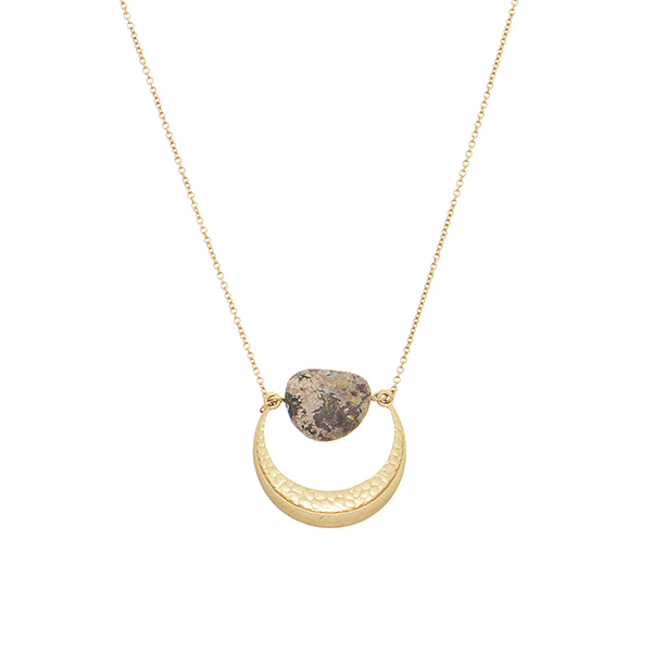 Burnished gold tone necklace featuring a crescent moon casting with natural stone decor. Approximately 28" in length.