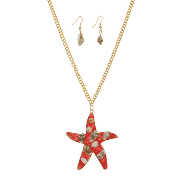 Gold tone necklace set featuring a coral starfish pendant with sea shell accents. Approximately 31" in length.