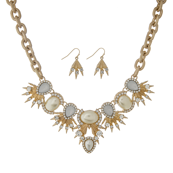 Wholesale matte gold statement necklace set displaying faux pearls white cabocho
