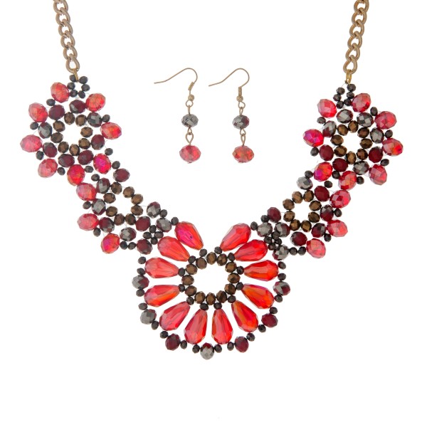 Wholesale gold necklace set displaying floral red gray brown glass beads