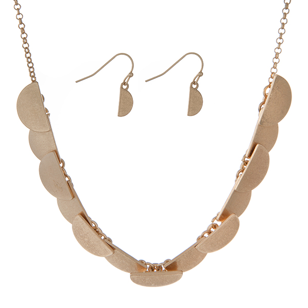 Burnished gold tone necklace set featuring half circles and matching earrings. Approximately 16" in length. 