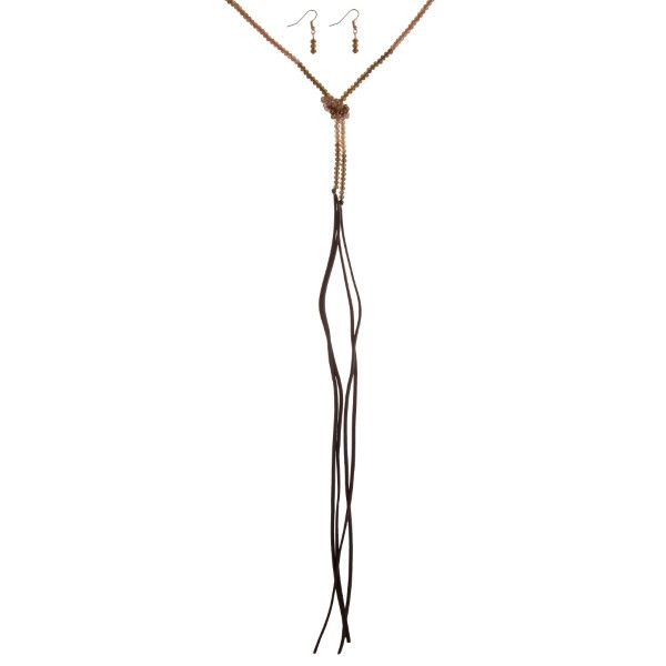 Brown beaded open lariat wrap necklace with faux leather tassels. Approximately 70" in length. 