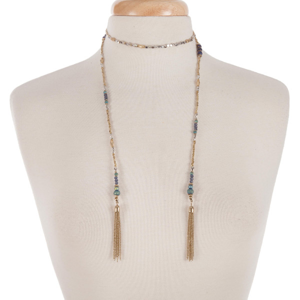 Two tone lariat necklace with blue and turquoise beads, and chain tassels.
