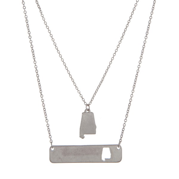 Silver tone double layer necklace with a Alabama pendant and a bar with the state shape cutout. Approximately 18" in length. 