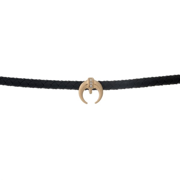 Black braided leather cord choker necklace with a crescent pendant. Approximately 13" in length