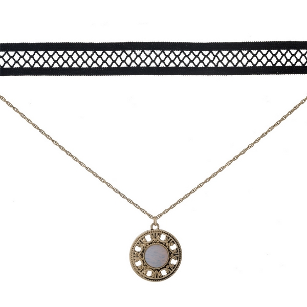 Black and gold tone, double layer choker with a circle pendant, accented by an opal stone. Approximately 12" in length.