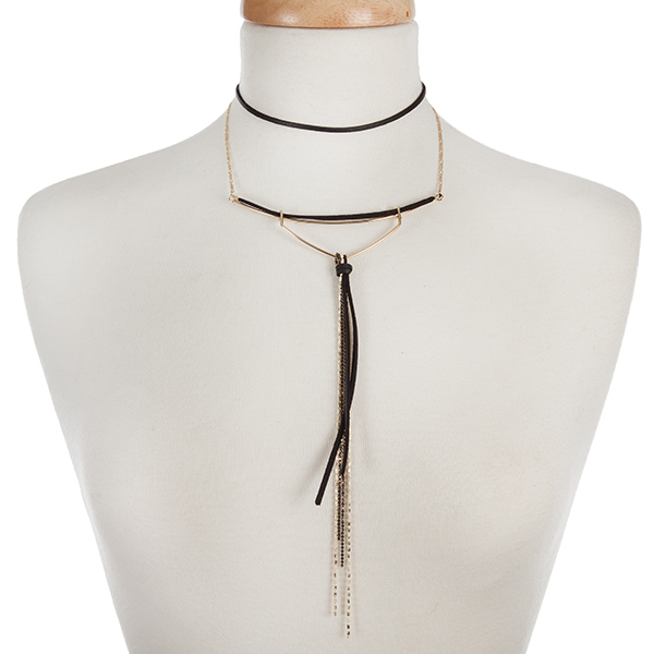 Gold tone and black faux suede choker with a beaded tassel accent. Approximately 12" in length. 