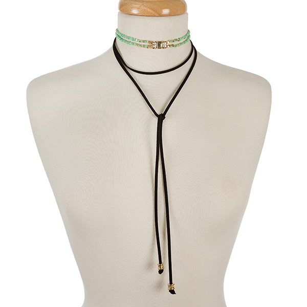 Mint green and gold tone beaded choker with a black faux suede layer. Approximately 12" in length. 