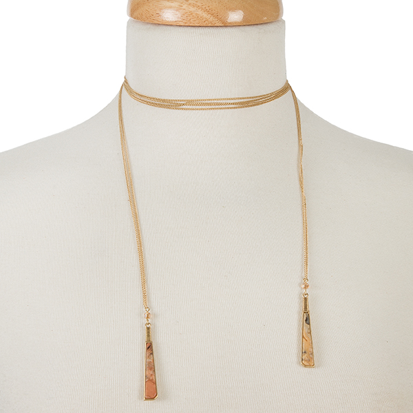 Dainty gold tone wrap necklace with natural stones on the ends. Approximately 52" in length. 