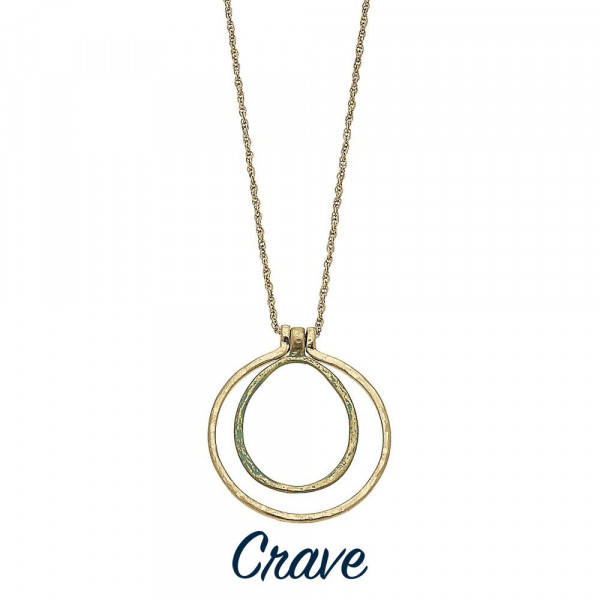 Long nested oval necklace with patina finish detail and a twisted rope chain. Chain is approximately 30" long. Pendant is approximately 2" tall. 