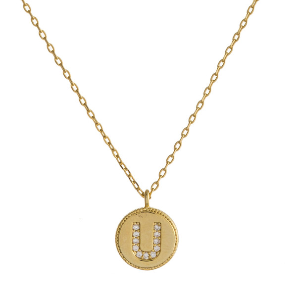 Dainty gold cable chain necklace featuring a disc pendant with "U" initial and cubic zirconia details. Pendant approximately 1cm in diameter. Approximately 16" in length overall.