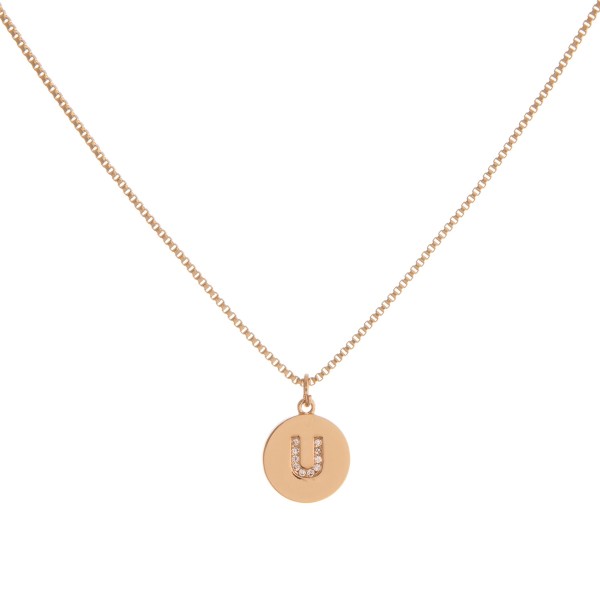 Dainty gold cubic zirconia initial "U" necklace. 

- Pendant approximately 1cm in diameter
- Approximately 16" in length with 3" extender