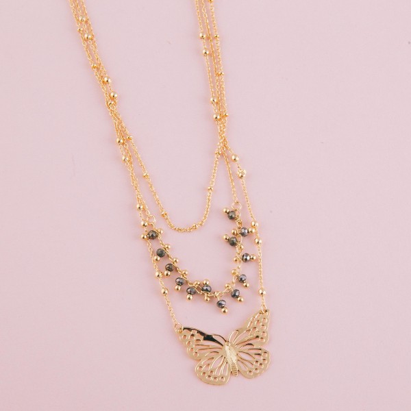 Layered beaded butterfly necklace.

- Shortest layer approximately 14" L
- Approximately 18" L overall 
- 3" extender