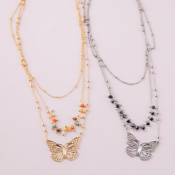 Layered beaded butterfly necklace.

- Shortest layer approximately 14" L
- Approximately 18" L overall 
- 3" extender