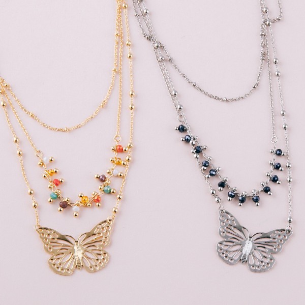 Layered beaded butterfly necklace.

- Shortest layer approximately 14" L
- Approximately 18" L overall 
- 3" extender