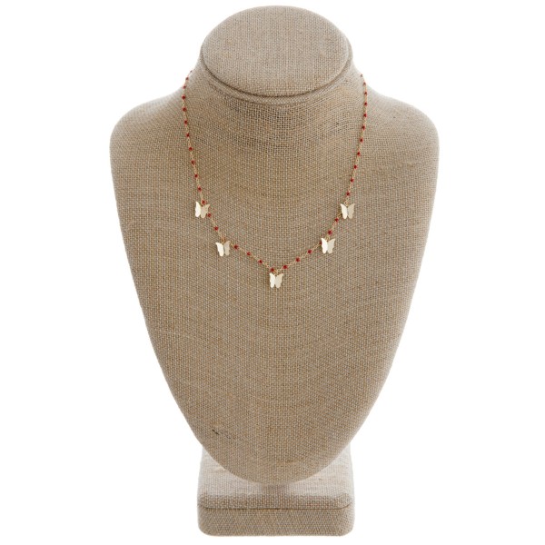 Dainty enamel color coated butterfly necklace. 

- Approximately 16" in length