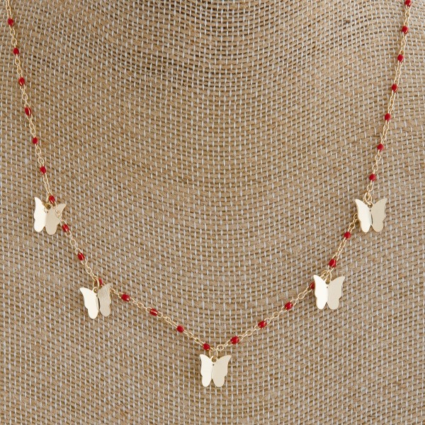 Dainty enamel color coated butterfly necklace. 

- Approximately 16" in length