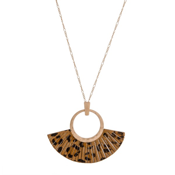 Faux leather cowhide leopard print tassel pendant necklace.

- Pendant approximately 3" in length
- Approximately 36" in length overall