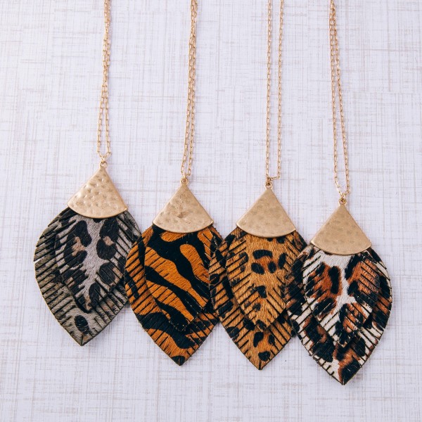 Long doubled genuine leather leopard print feather pendant necklace.

- Pendant approximately 3.5" in length
- Approximately 36" in length overall with 3" extender