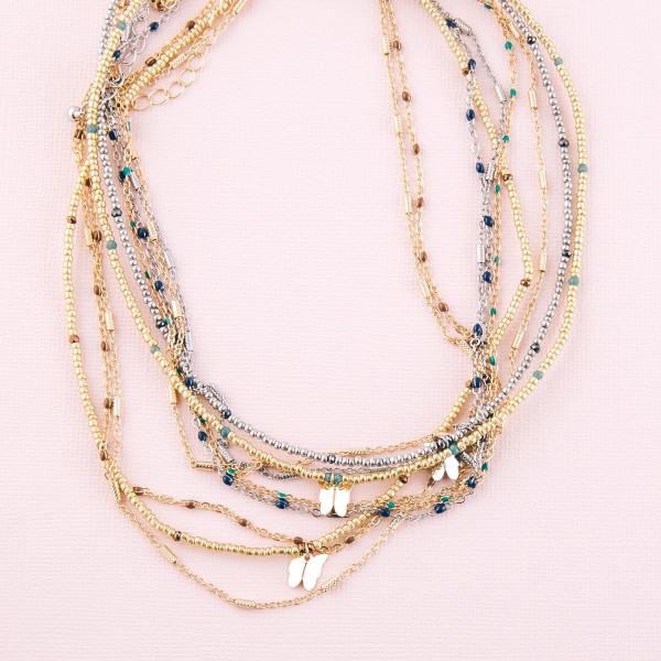 Short seed beaded enamel coated butterfly layered necklace.

- Shortest layer approximately 12" L
- Approximately 16" L 
- 3" extender