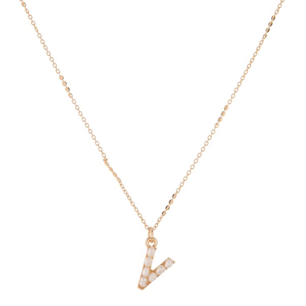 Gold pearl initial V pendant necklace.

- Pendant approximately .5" in size
- Approximately 15" in length overall with 3" extender