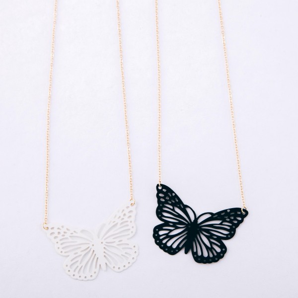 Coated cut out butterfly pendant necklace.

- Pendant approximately 2" 
- Approximately 16" L
- 3" extender