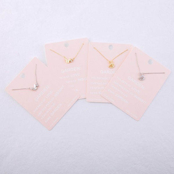 Dainty butterfly lucky charm necklace with rhinestone accent.

- Pendant approximately 1cm
- Approximately 16" L
- 2" extender