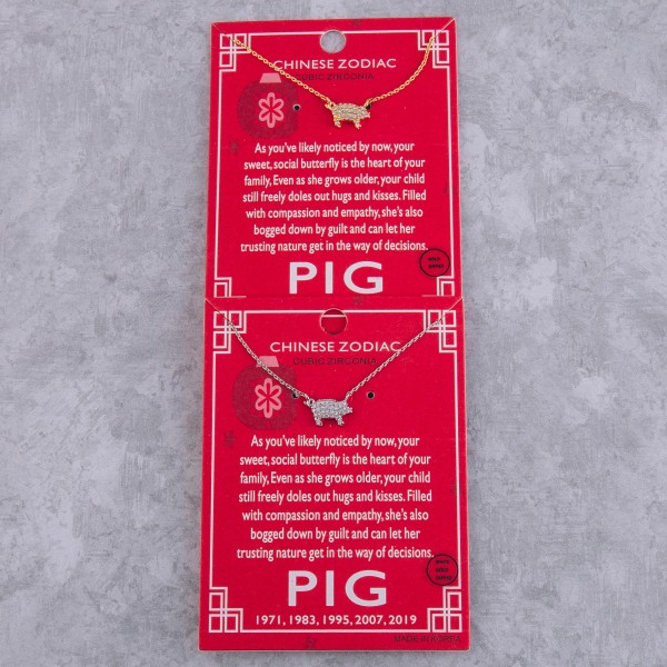 Gold dipped Chinese Zodiac Cubic Zirconia "Pig" pendant necklace.

"As you've likely noticed by now, your 
 sweet, social butterfly is the heart of your
 family, Even as she grows older, your
 child still freely doles out hugs and kisses.
 Filled with compassion and empathy, she's 
 also bogged down by guilt and can let her 
 trusting nature get in the way of decisions."
"1971, 1983, 1995, 2007, 2019" 

- Pendant approximately 1cm 
- Approximately 16" in length