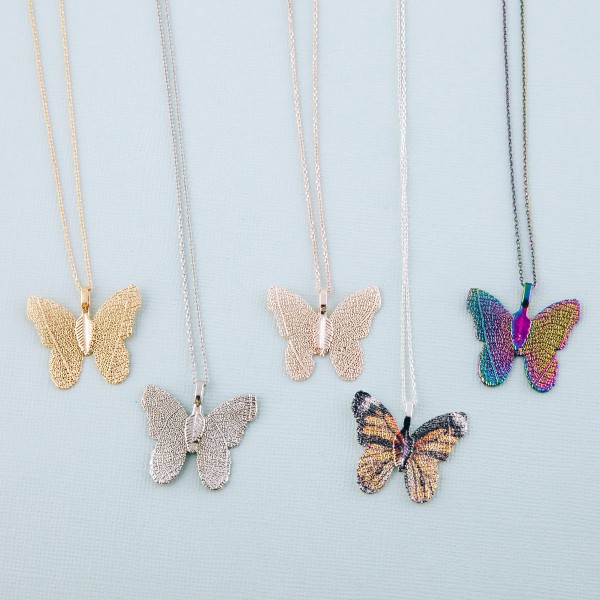 White Gold dipped filigree butterfly pendant necklace.

- Pendant approximately 1" 
- Approximately 18" L 
- 2" extender