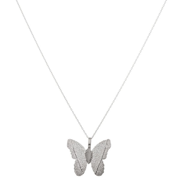 White Gold dipped filigree butterfly pendant necklace.

- Pendant approximately 1" 
- Approximately 18" L 
- 2" extender