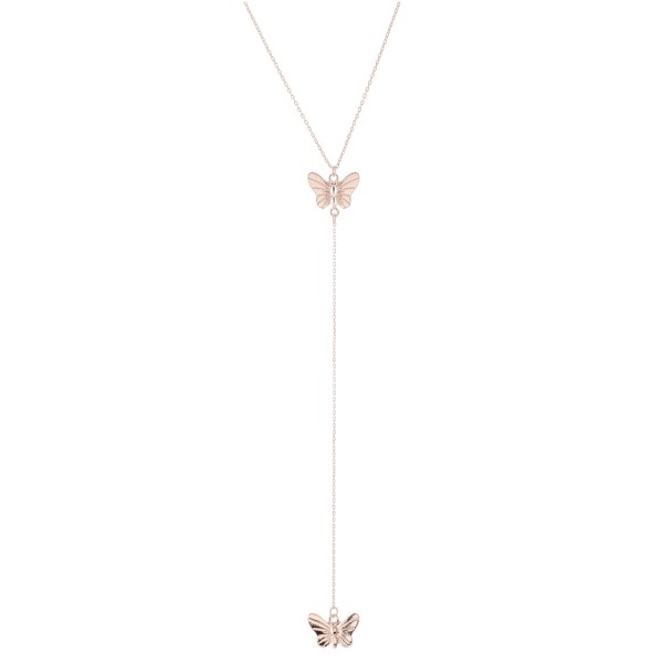 Rose Gold Y necklace featuring a thin chain and butterfly pendants 
- Approximately 16" L, Y pendant is approximately 26" L 
- Features a 3" extender