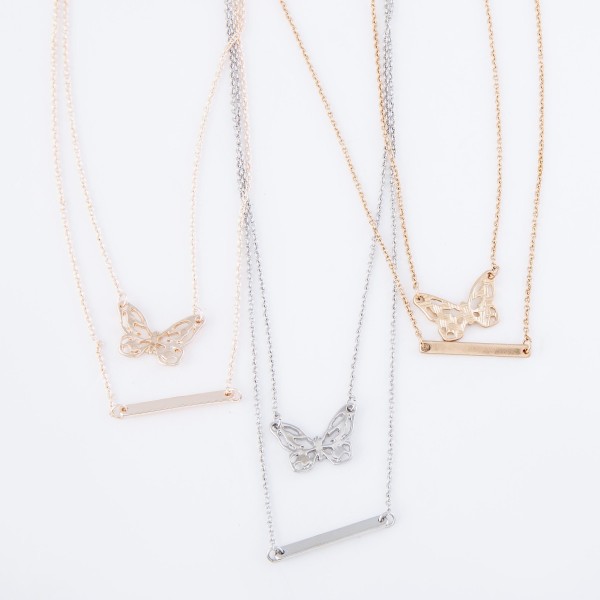 Double layered chain necklace featuring a butterfly pendant and a metal bar accent. 
- Approximately 16" L with a 3" extender 