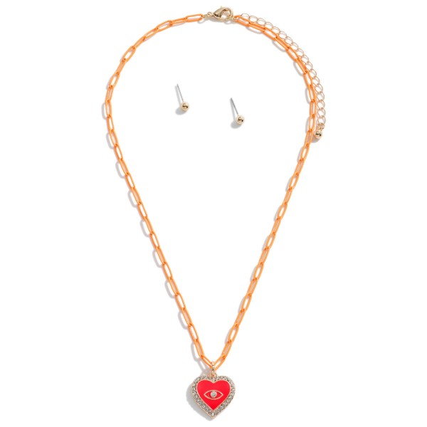 Colored Chain Link Necklace Featuring Evil Eye Heart Pendant With Rhinestone Accents and Gold Stud Earrings

- Approximately 16" Length
- 3" Extender