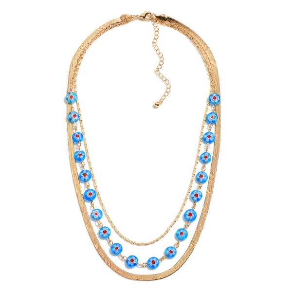 Gold Tone Layered Necklace Featuring Flower Beads

- Approximately 10" Length