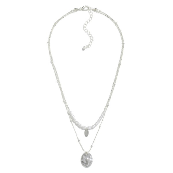 Layered Chain Link Necklace Featuring Pearl Beads and Hammered Metal Disk Pendant

- Approximately 18" L
- Extender 3" L