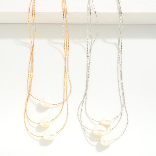 Layered Metal Rope Chain Link Necklace Featuring Pearl Bead Pendants

- Approximately 18" L
- Extender 3" L