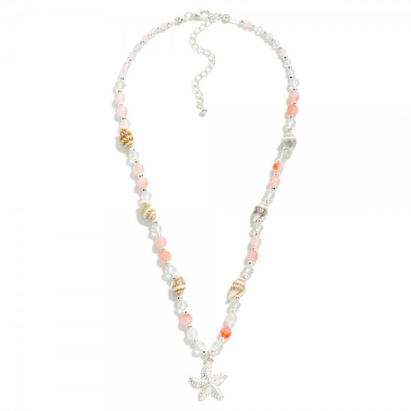 Beaded Necklace Featuring Shells & Starfish Pendant

-Approximately 16"L
-Extender 3"L