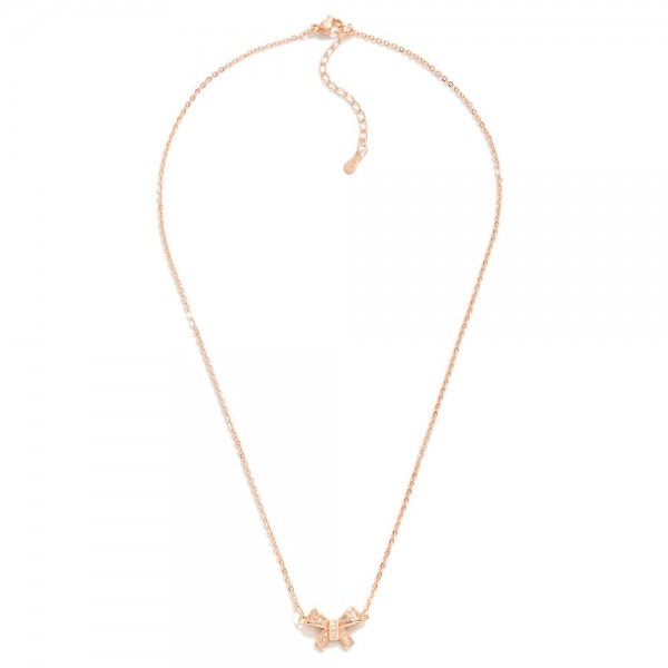 Dainty Rose Gold Chain Link Necklace Featuring Rhinestone Studded Bow Station

- Approximately 14" L
- Extender 2" L 