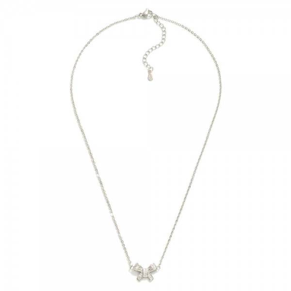 Dainty Metal Tone Chain Link Necklace Featuring Rhinestone Studded Bow Station

- Approximately 14" L
- Extender 2" L 