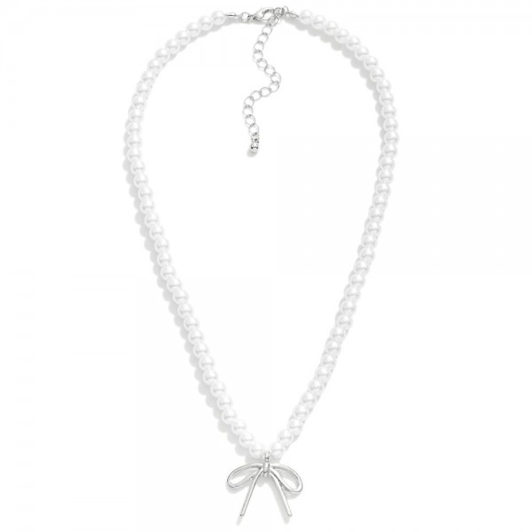 Pearl Bead Necklace Featuring Bow Pendant 

- Approximately 16" L
- Extender 2" L