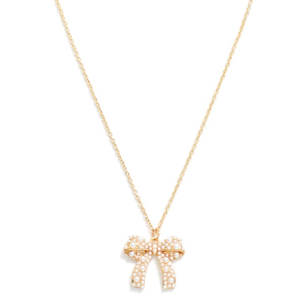 Dainty Chain Link Necklace Featuring Pearl Studded Bow Pendant 

- Approximately 16" L
- Extender 2"