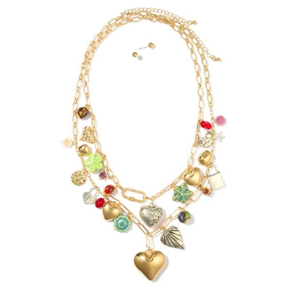Layered Paperclip Chain Link Charm Necklace Featuring Metal Tones, Flowers, Coins, Stone, & Hearts

-Metal Tone Stud Earrings Included
- Approximately 25" L
- Extender 2" L