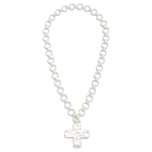 Metal Tone Circle Link Necklace Featuring Cross Pendent 

- Approximately 20" L
- Extender 3" L

