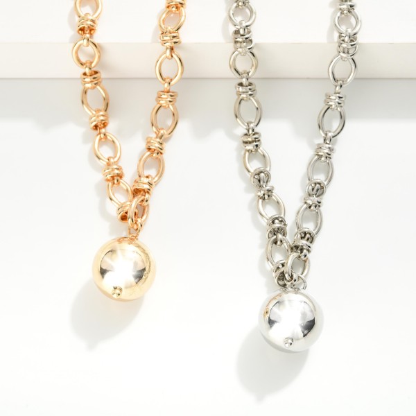 Oval Chain Link Necklace Featuring Layered Metal Hoop Stations & Ball Pendant

- Approximately 14" L
- Extender 3" L