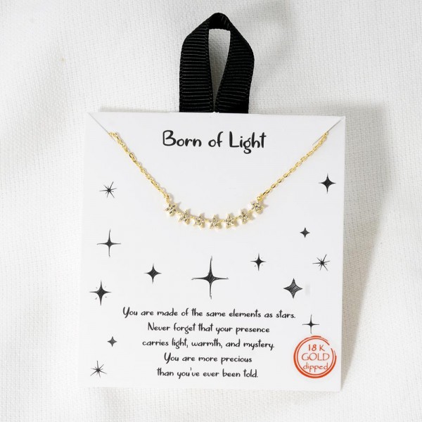 Dainty Chain Link Necklace Featuring Cubic Zirconia Stars Pendant			
					
- Approximately 16" L					
- Extender 2" L					
- Hypoallergenic Brass Base					
- 18K Gold Dipped					
- Card: "You are made of the same elements as stars. Never forget that your presence carries light, warmth, and mystery. You are more precious than you've ever been told. "					