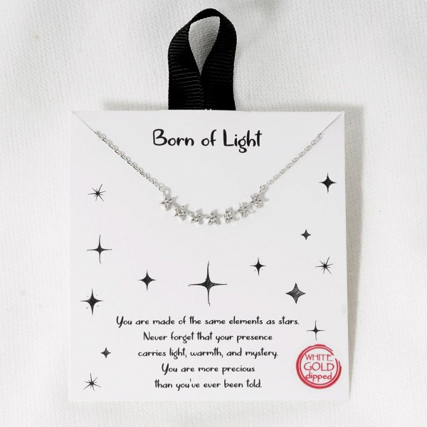 Dainty Chain Link Necklace Featuring Cubic Zirconia Stars Pendant			
					
- Approximately 16" L					
- Extender 2" L					
- Hypoallergenic Brass Base					
- 18K Gold Dipped					
- Card: "You are made of the same elements as stars. Never forget that your presence carries light, warmth, and mystery. You are more precious than you've ever been told. "					