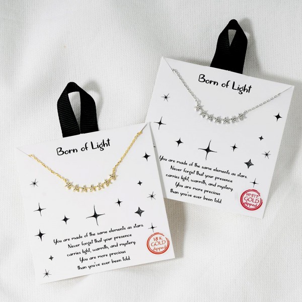 Dainty Chain Link Necklace Featuring Cubic Zirconia Stars Pendant			
					
- Approximately 16" L					
- Extender 2" L					
- Hypoallergenic Brass Base					
- 18K Gold Dipped					
- Card: "You are made of the same elements as stars. Never forget that your presence carries light, warmth, and mystery. You are more precious than you've ever been told. "					