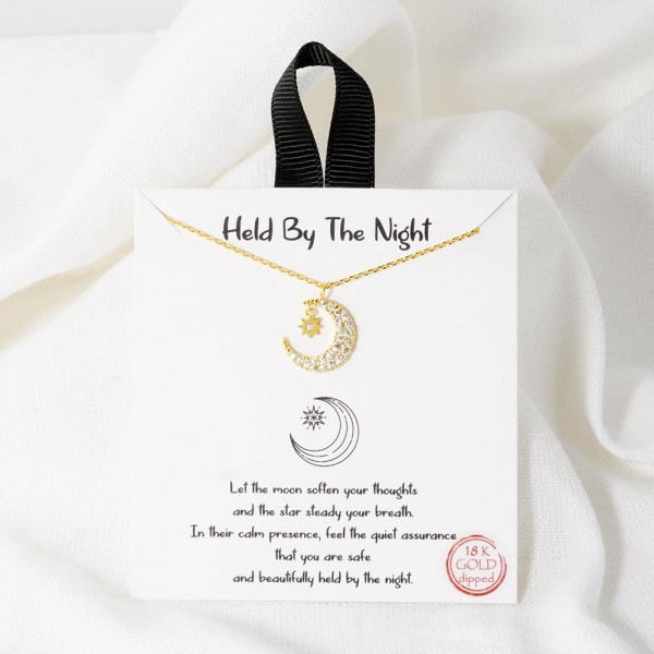 Dainty Chain Link Necklace Featuring Cubic Zirconia Moon & Stars Pendant  				
					
- Approximately 16" L					
- Extender 2" L					
- Hypoallergenic Brass Base					
- 18K Gold Dipped					
- Card: "Let the moon soften your thoughts and the star steady your breath. In their calm presence, feel the quiet assurance that you are safe and beautifully held by the night."