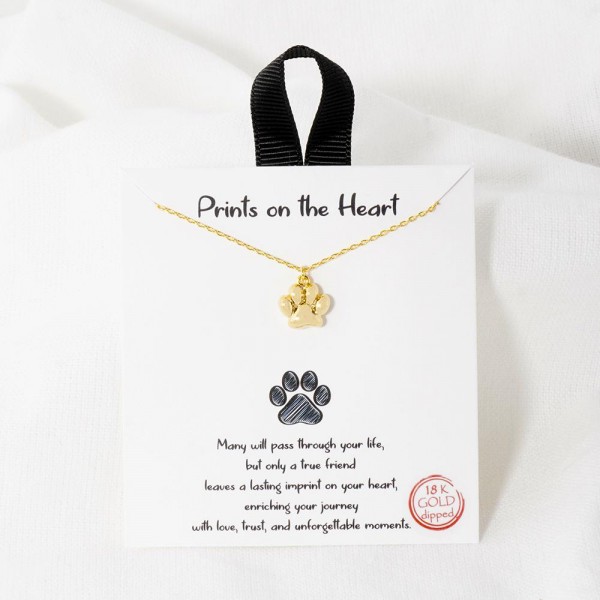 Dainty Chain Link Necklace Featuring Metal Tone Paw Print Pendant 				
					
- Approximately 16" L					
- Extender 2" L									
- Hypoallergenic Brass Base					
- 18K Gold Dipped					
- Card: "Many will pass through your life, but only a true friend leaves a lasting imprint on your heart, enriching your journey with love, trust, and unforgettable moments."					