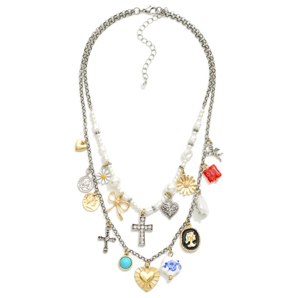 Layered Chain Link Charm Necklace Featuring Metal Tone Charms, Flowers, Pearls, & Crosses

- Approximately 16" L
- Extender 3" L